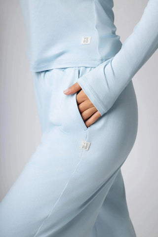 Yebo Clothing's Addison Sweatpant epitomizes minimalist loungewear with its wide leg and breathable design. As part of the I See You movement, this piece is perfect for anyone seeking sustainable performance activewear. Enjoy comfortable days with this carbon neutral clothing, made from recycled materials.