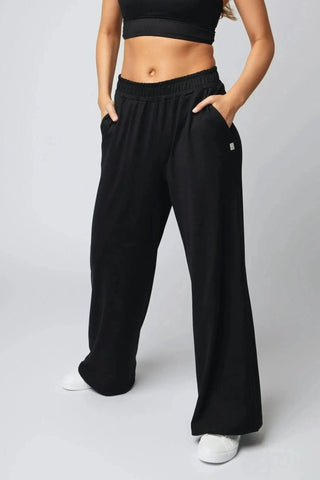 Addison Sweatpant by Yebo Clothing, crafted from sustainable performance activewear with breathable workout gear, featuring eco-friendly gym clothes made from recycled materials for an elevated street style. Perfect for mindful movement and suitable as minimalist loungewear, these performance joggers exemplify conscious fashion and feature moisture-wicking fabric in a stylish design.