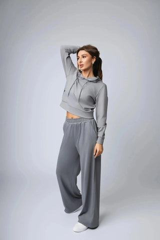 Versatile Addison Sweatpant from Yebo Clothing, offering a smooth fit and a wide leg design, made with ethical fitness apparel materials and promoting the I See You movement.
