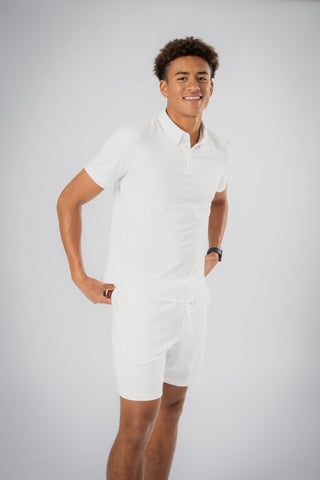 The Dylan Polo displayed on a hanger, demonstrating its versatility as minimalist loungewear, blending style with sustainability for everyday wear or weekend adventures.