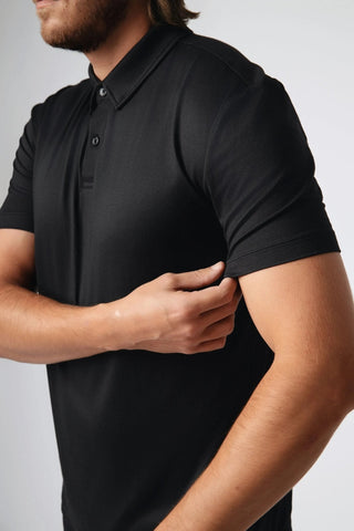 Close-up of the Dylan Polo from Yebo Clothing, highlighting the breathable workout gear crafted with recycled polyester, ideal for ethical fitness apparel and sustainable athleisure, ensuring comfort and style.