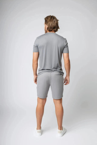 Ethan T-Shirt styled with casual wear, combining comfort and sustainability, suited for those seeking ethical fitness apparel and comfortable loungewear.