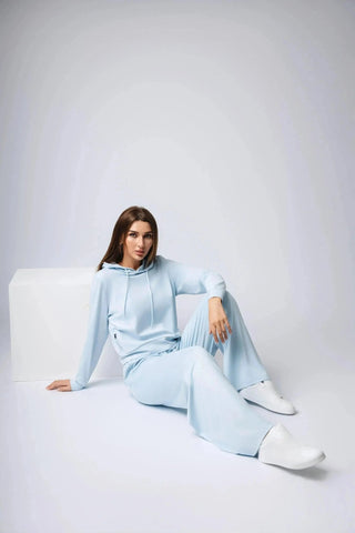 Yebo Clothing's Harper Hoodie, a modern performance hoodie made with carbon neutral clothing practices, great for layering and staying stylish during workouts and relaxation.