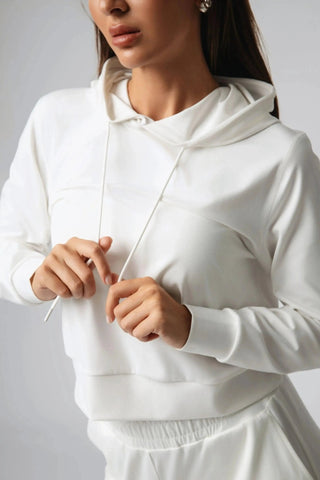 Side view of the Harper Hoodie by Yebo Clothing, emphasizing its adjustable drawstrings and moisture-wicking fabric. This sustainable athleisure piece is great for yoga or as mens joggers alternative.