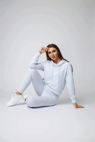 Stylish Harper Hoodie by Yebo Clothing, featuring a cropped fit that combines comfort with ethical fashion. Crafted from recycled polyester, it embodies sustainable athleisure, perfect for those seeking eco-friendly gym clothes and minimalist loungewear.
