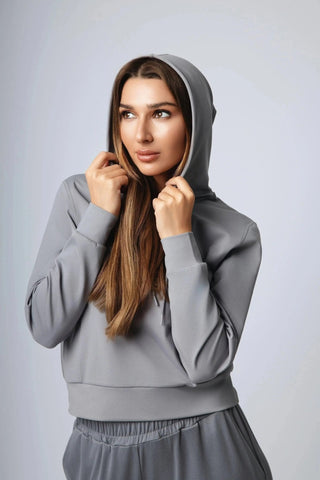 Close-up view of the Harper Hoodie by Yebo Clothing, showcasing its breathable workout gear made from recycled polyester. Ideal as ethical fitness apparel for lounging or post-run wear.