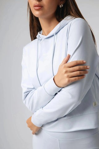 The Harper Hoodie from Yebo Clothing, designed for eco-friendly gym clothes usage, showcases moisture-wicking fabric and a comfortable silhouette, aligning with the I See You movement and offering stylish options in sustainable athleisure and conscious fashion.