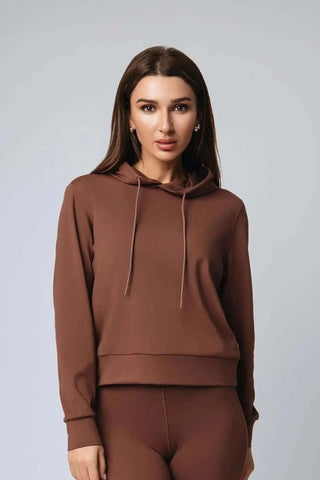 Close-up of the Harper Hoodie by Yebo Clothing, emphasizing its minimalist loungewear style made from recycled polyester, reflecting the I See You movement in sustainable athleisure and conscious fashion.