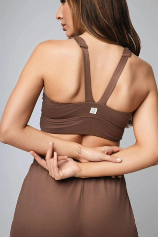 Jordan Sports Bra in action, showcasing its stylish yet functional design by Yebo Clothing. This sustainable activewear supports your fitness goals while being a key part of your minimalist loungewear and yoga leggings collection.