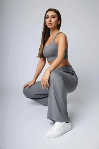 Side view of the Jordan Sports Bra by Yebo Clothing, emphasizing its flattering V-back design, made with sustainable athleisure that combines style and recycled polyester.