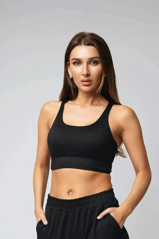 The Jordan Sports Bra by Yebo Clothing showcases sustainable performance activewear with an eco-friendly design made from recycled materials. This breathable workout gear is perfect for those embracing mindful movement and ethical fitness apparel.