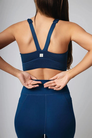 The Jordan Sports Bra by Yebo Clothing combines style and performance with sustainable performance activewear, perfect for eco-friendly gym clothes lovers who appreciate ethical fitness apparel made from recycled materials.