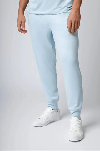 Dynamic shot of Logan Jogger by Yebo Clothing, a staple in sustainable athleisure, made for carbon neutral clothing lovers, featuring zippered pockets for convenience.