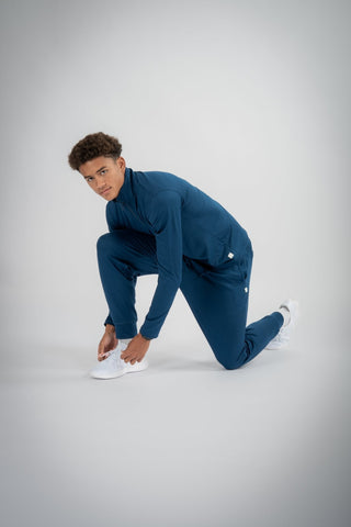 Logan Jogger by Yebo Clothing, crafted from recycled materials for sustainable performance activewear. Perfect for mindful movement, these breathable workout gear joggers are designed for training or lounging.