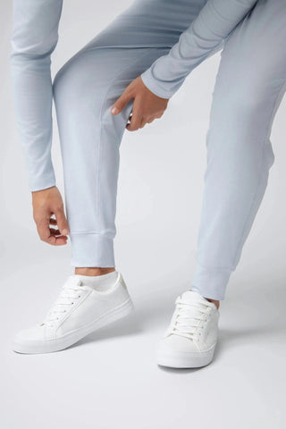 Stylish Logan Jogger by Yebo Clothing, highlighting its minimalist loungewear aesthetic. Made from carbon neutral clothing materials using recycled materials for a conscious fashion choice.