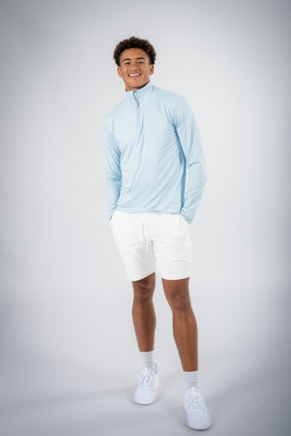 The Lucas Quarter Zip by Yebo Clothing on display in a minimalist setting, highlighting its moisture-wicking fabric and commitment to sustainable athleisure.