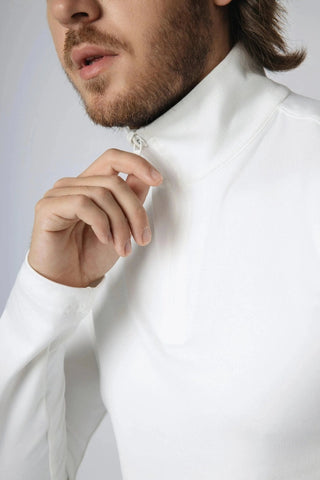 Dynamic lifestyle shot featuring the Lucas Quarter Zip from Yebo Clothing, a perfect example of conscious fashion blending with breathable workout gear and sustainable gym clothes.