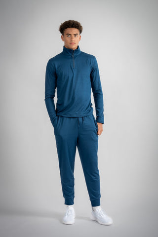 A stylish image of the Lucas Quarter Zip by Yebo Clothing, showcasing sustainable performance activewear crafted from recycled materials, ideal for mindful movement and breathable workout gear.