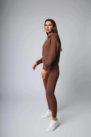 Maha Legging by Yebo Clothing displayed in a casual setting, perfect for mindful movement and chic loungewear, representing conscious fashion and sustainable athleisure made from recycled polyester.