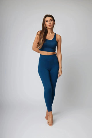 Close-up of the high waist design of the Maha Legging by Yebo Clothing, showcasing its flattering silhouette, breathable workout gear, and moisture-wicking fabric for ethical fitness apparel.