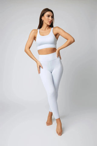 Back view of Maha Legging by Yebo Clothing emphasizes the moisture-wicking fabric ideal for yoga leggings and minimalist loungewear that supports the I See You movement.