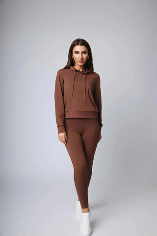 Maha Legging by Yebo Clothing showcasing buttery soft fabric that provides a sleek silhouette, designed for both yoga and everyday wear, highlighting sustainable performance activewear made from recycled materials.