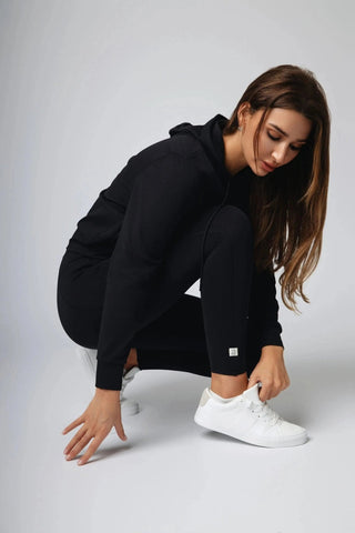 Close-up of the Maha Legging from Yebo Clothing, showcasing the buttery soft sculpting fabric that offers comfort and support. These eco-friendly yoga leggings are made from recycled polyester, promoting conscious fashion while providing moisture-wicking capabilities for your active lifestyle.