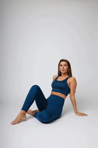 Side pockets of the Maha Legging by Yebo Clothing, combining style and convenience with minimalist loungewear and sustainable performance activewear made from recycled polyester.
