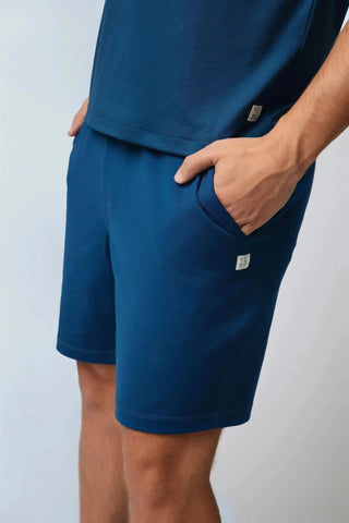 Mason Shorts by Yebo Clothing, featuring a relaxed fit that embodies ethical fitness apparel. Made from recycled materials, these shorts offer moisture-wicking fabric that enhances your workout experience as part of sustainable athleisure.