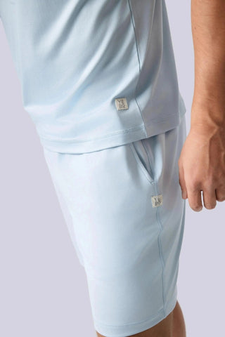 Mason Shorts by Yebo Clothing worn outdoors, demonstrating sustainable athleisure style, promoting conscious fashion with moisture-wicking fabric for active lifestyles.