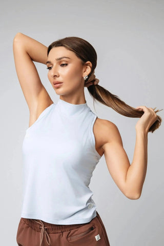 Dynamic shot of the Sophie Tank Top in action, illustrating the comfort and style of this sustainable activewear piece, designed for conscious fashion lovers.