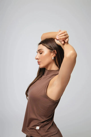 Front view of Yebo Clothing's Sophie Tank Top worn casually, emphasizing its place in conscious fashion and sustainable fitness, seamlessly transitioning from gym to brunch with ease.