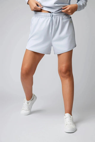 Yebo Clothing's Sydney Shorts offer a sleek silhouette and minimalist loungewear design, made with moisture-wicking fabric to support your mindful movement and sustainable athleisure.
