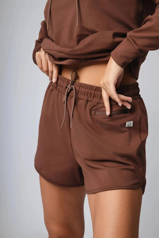 Discover the comfort of the Sydney Shorts by Yebo Clothing, crafted for athletes with sustainable materials. These shorts provide stylish function for your workout needs and align with ethical fitness apparel values.