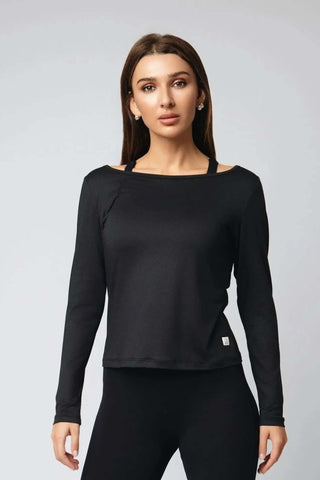 The Valentina Ballerina Shirt from Yebo Clothing showcases effortless style with its breathable design, perfect for sustainable performance activewear and mindful movement. Crafted from recycled materials, this eco-friendly gym clothes piece features moisture-wicking fabric, making it an ideal choice for those who value ethical fitness apparel.