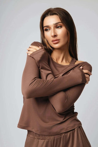 Lifestyle image of a model wearing the Valentina Ballerina Shirt by Yebo Clothing, demonstrating its perfect fit for mindful movement in eco-friendly gym clothes made from ethical fitness apparel.