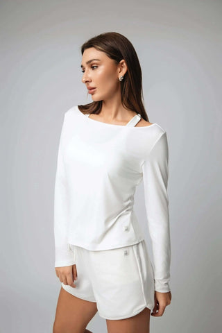 The Valentina Ballerina Shirt by Yebo Clothing worn in a relaxed setting, demonstrating its versatility as sustainable athleisure and conscious fashion.