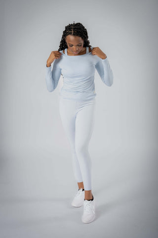 Highlighting the Valentina Ballerina Shirt from Yebo Clothing, this image features the elegant boat neckline and relaxed fit, crafted from moisture-wicking fabric for a comfortable, carbon neutral clothing option in your wardrobe.