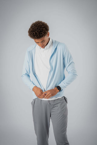 Close-up of the Zahaan Hoodie by Yebo Clothing highlighting its moisture-wicking fabric and ribbed cuffs. This performance hoodie is crafted from recycled polyester, representing conscious fashion in men’s joggers, ideal for anyone seeking ethical fitness apparel.