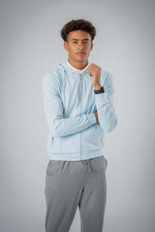 The Zahaan Hoodie by Yebo Clothing is a cozy and stylish piece made from sustainable performance activewear, perfect for any laid-back occasion or post-workout recovery. This eco-friendly hoodie features a zip-up design, ribbed cuffs, and is crafted from ethical fitness apparel with breathable workout gear for ultimate comfort. Enjoy mindful movement with this minimalist loungewear made from recycled materials, ensuring you stay warm while embracing conscious fashion in your active lifestyle.